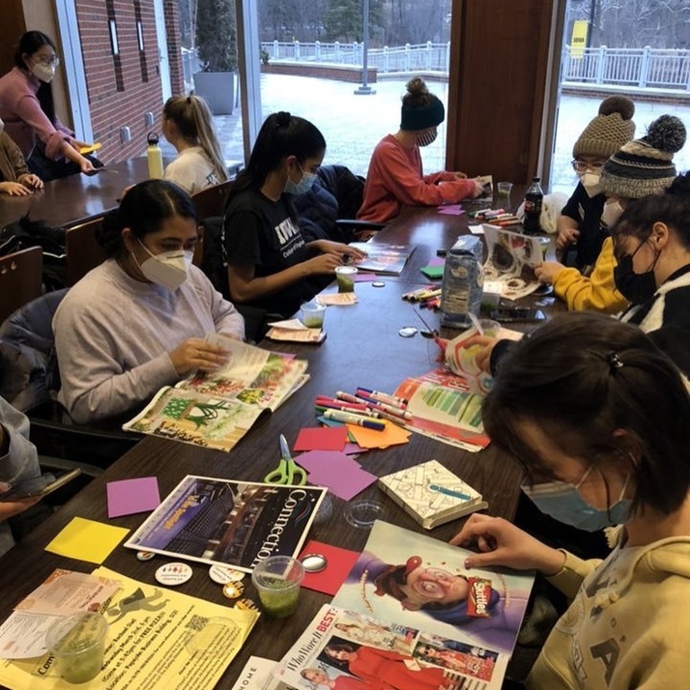 group of students making buttons