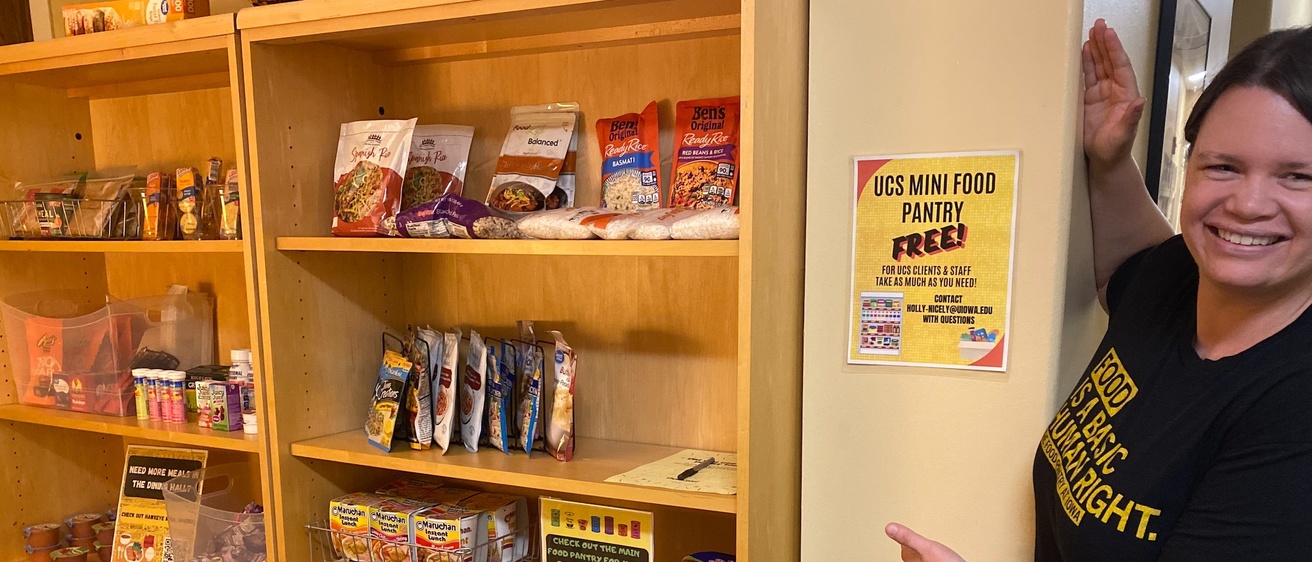 Dr. Holly Nicely with the UCS mini food pantry at Westlawn